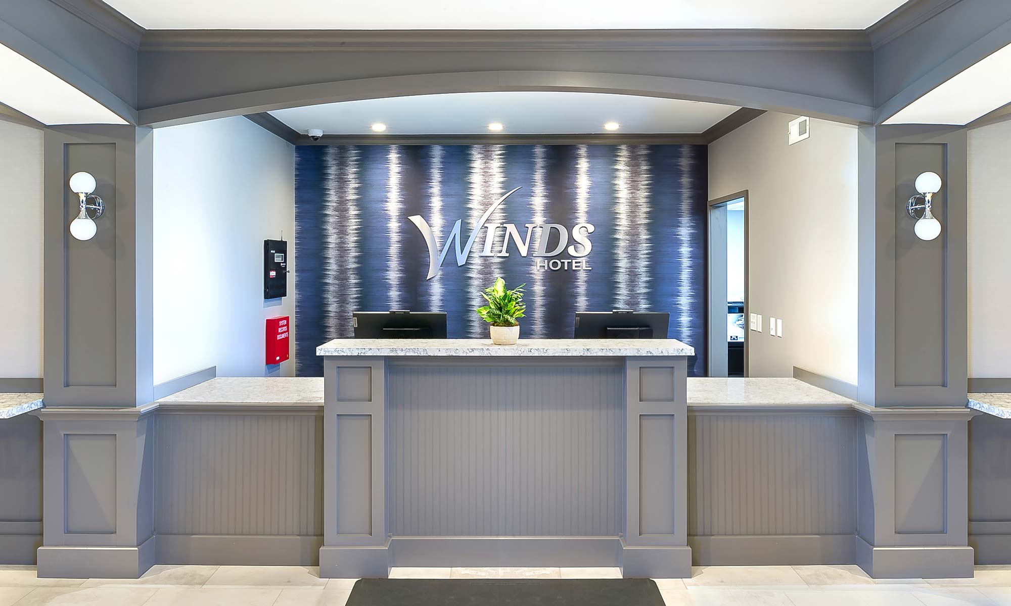 Photo of the WINDS Hotel front desk